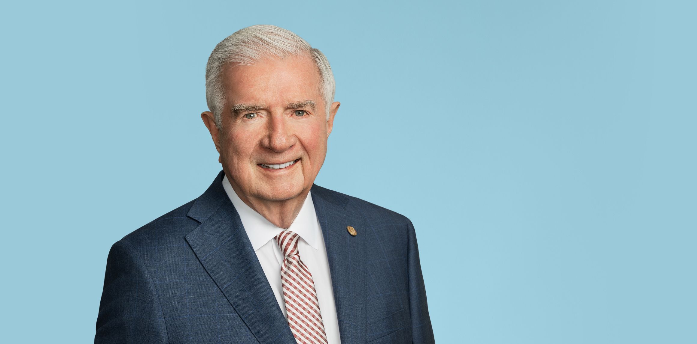 The Honorable Gregory H. Laughlin, Senior Counsel